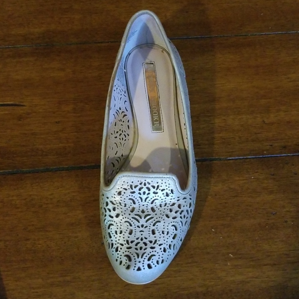 Metallic cut out flats.